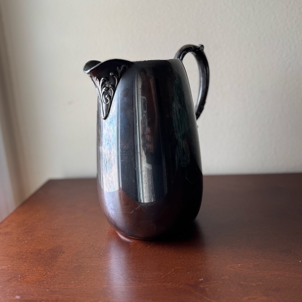Silver-Tone Decorative Pitcher with Ornate Spout